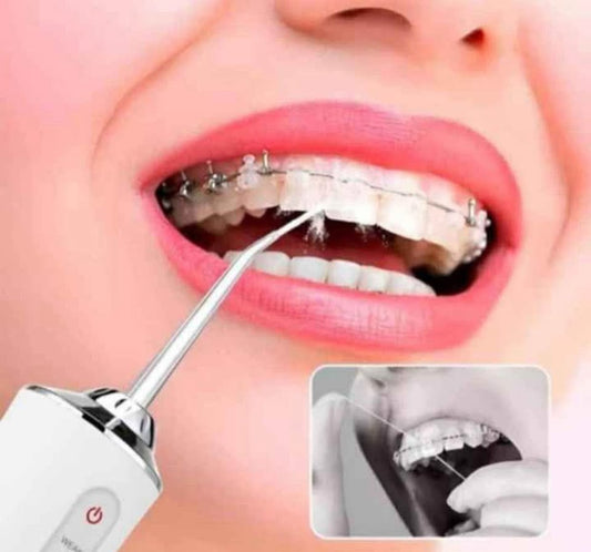 Irrigador oral portátil para limpieza profunda e higiene bucal